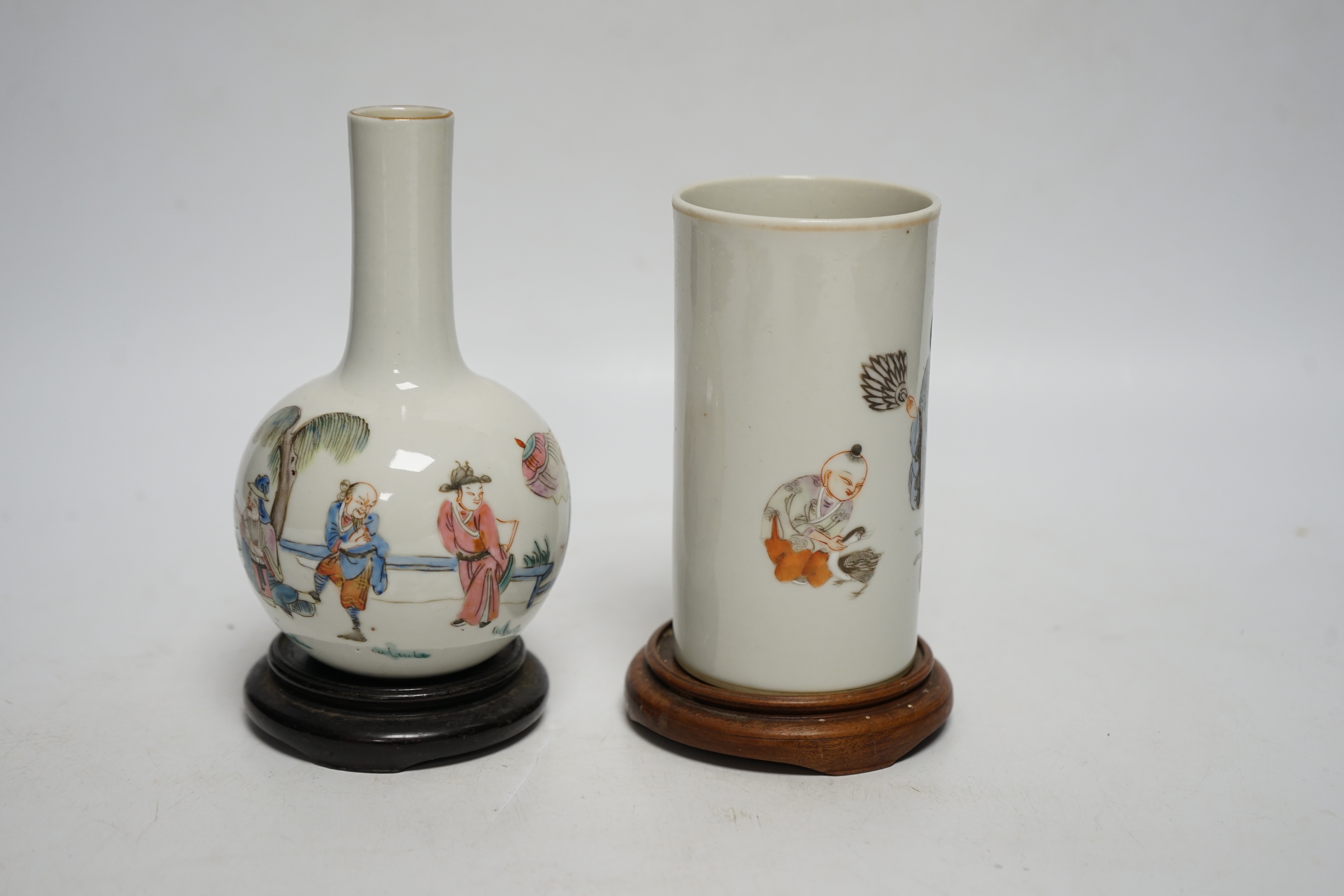 A Chinese famille rose brush pot and bottle vase, both with stands, tallest 16cm